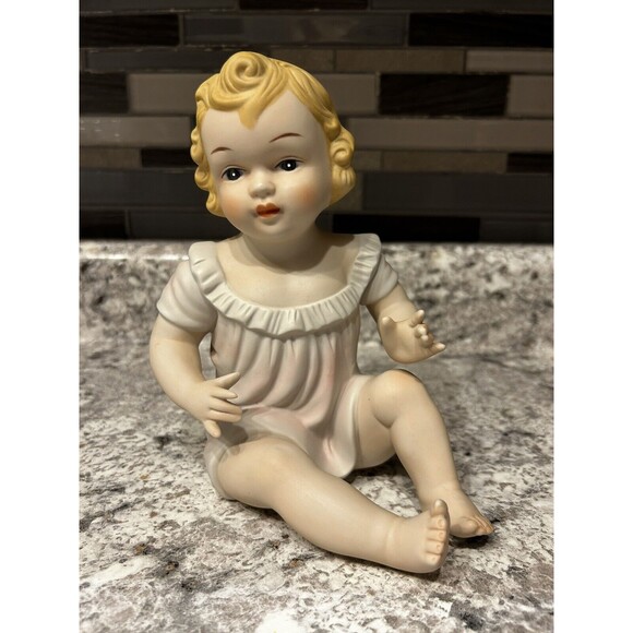 Vintage Porcelain Bisque Piano Baby 7” Blonde girl Sitting Pink Dress With Bow - Picture 1 of 4